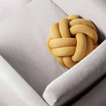image2-2351-2000-knotcushionyellow.jpg