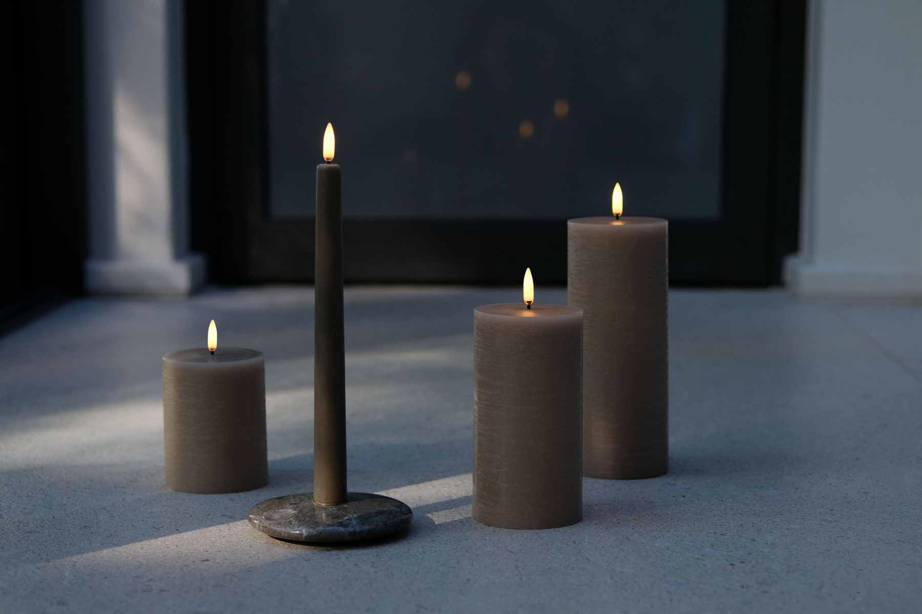 Beige-assorted-pillar-candles-&-a-taper-large.jpg