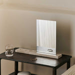 FermLiving_SS25_CasetaTableMirror_Travertine_1104271109_PebbleBox_Medium_SandCream_1104270731_DimpleGlasses_SetOf2_Clear_1104270155.jpg