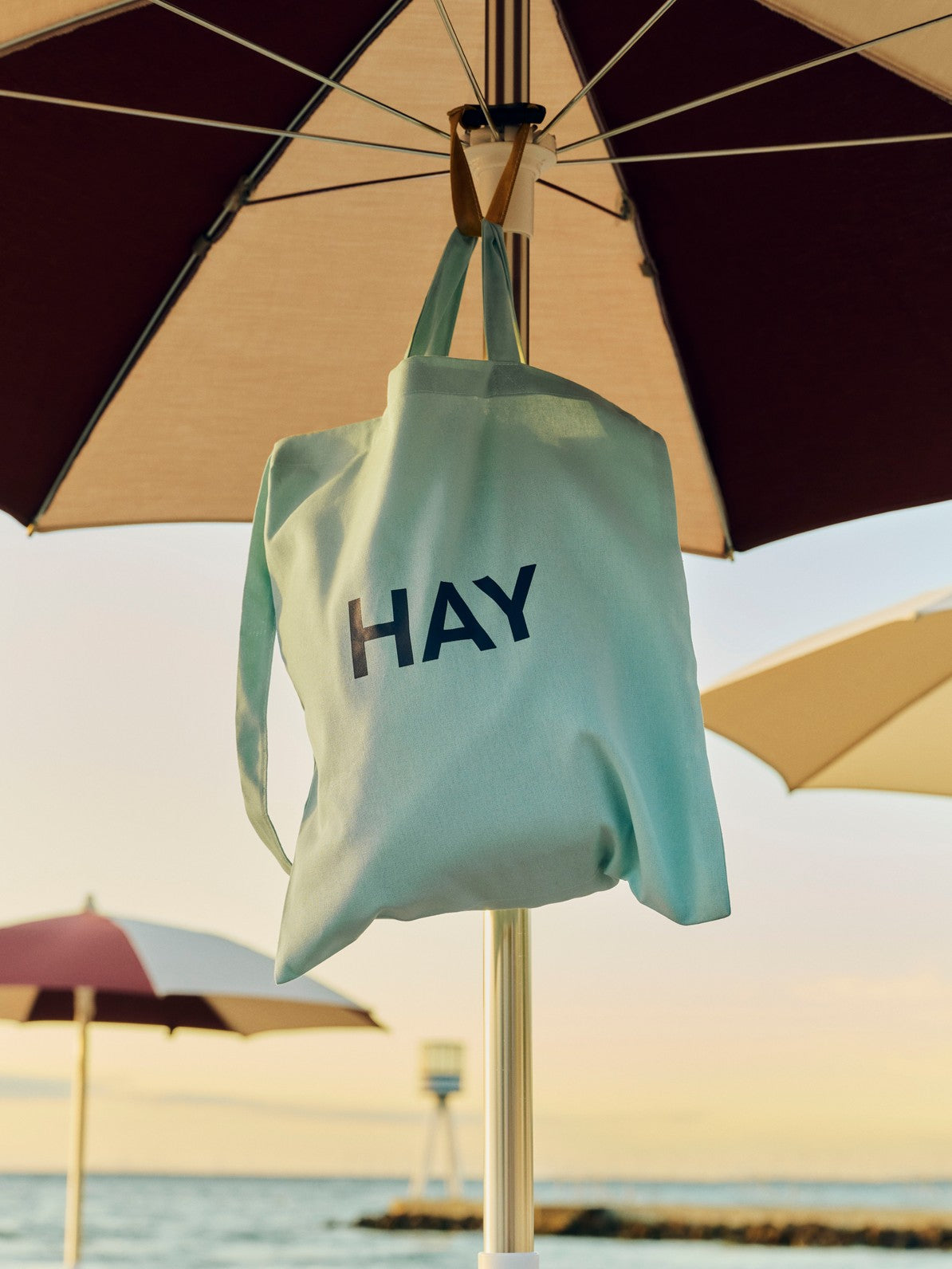 HAY Tote Bag Icy blue_Terrazza Parasol Octagon off white and burgundy.jpg