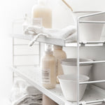 inspiration-string-pocket-metal-white-hooks-upclose_cropped_portrait_large.jpg