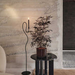 fermLIVING_AW24_ValseFloorCandleHolder_Black_1104269850_TaulaSideTable_Black_1104270182_CorduroyPot_CarobBrown_1104270075.jpg