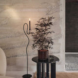 fermLIVING_AW24_ValseFloorCandleHolder_Black_1104269850_TaulaSideTable_Black_1104270182_CorduroyPot_CarobBrown_1104270075.jpg