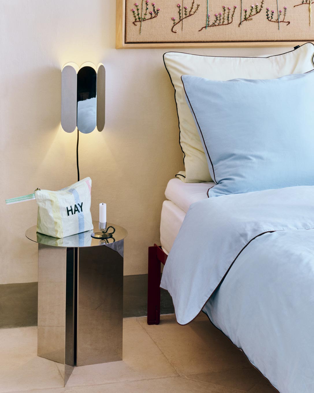 Slit-Table-High-mirror_Arcs-Wall-Switch-mirror_Outline-Bedlinen-soft-blue_Tiny-Candleholder-Curved-grey_Candy-Stripe-Wash-Bag-M-multi.jpg