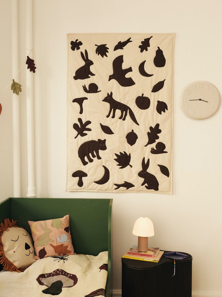 FermLiving_AW26_LundenBlanket_Off-white-DarkChocolate_1104274475_LoopiWallClock_Cream_1104274170_LundenCushion_Rose-Multi_1104274480_IsolaStorageTable_DarkStained_1104273518_2.jpg