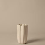FermLiving_SS26_PackshotsWithBackground_NiumVase_H23_Off-white_1104272492.jpg