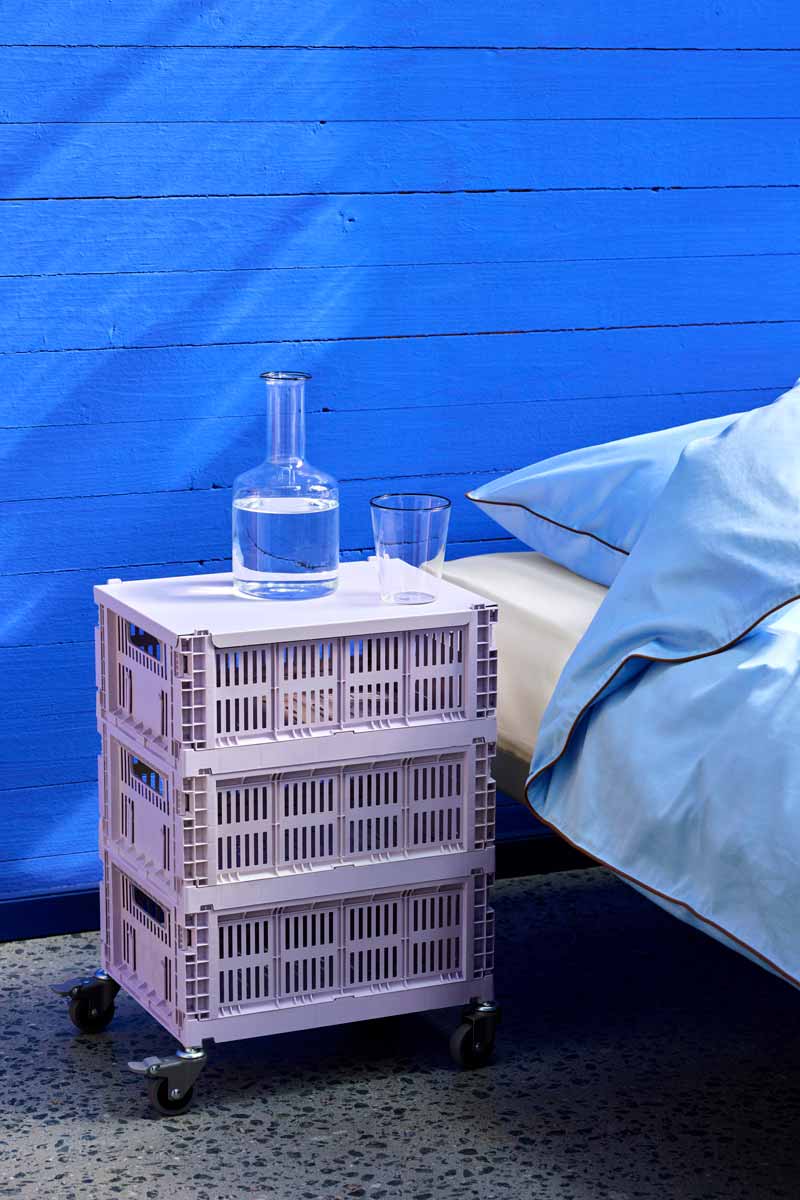 HAY-Colour-crate-M-lavender_HAY-Colour-crate-Lid-M-lavender_Rim-Carafe-clear-with-black-rim_Rim-Glass-set-of-2-clear-with-black-rim_Outline-Duvet-Cover-140x200-soft-blue.jpg