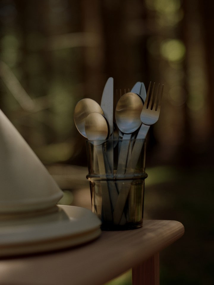 FermLiving_Holiday2025_SteloCutlery_SetOf4_BrushedStainlessSteel_1104272000_BoyaTallGlasses_SetOf2_SmokedGrey_1104272031 (1).jpg