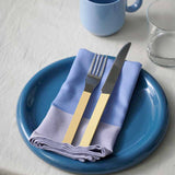 Barro-Cup-set-of-2-light-blue_Barro-Plate-24-set-of-2-dark-blue_Ram-Napkin-lavender_MVS-Cutlery-set-of-4-yellow.jpg