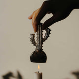 Candlesnuffer_with_hand_high.jpg