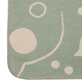 FermLiving_SS26_SkyeBlanket_TeaGreen-Parchment_1104273045_3.png
