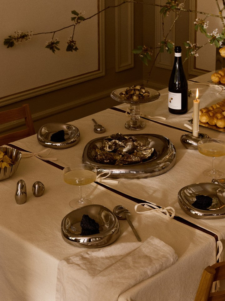 FermLiving_Holiday2026_LinkModularTablecloth_1104274204_BellureCentrepiece_1104272105_BellureBowl_1104272106_NubePlanterFeet_1104272482_BellureCandleHolder_1104273898_DamoGlassCentrepiece_1104272103_OrevoSaltandPepperShakers_1104271994.jpg