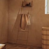 FermLiving_SS26_DoraTowelLadder_1104272536_SamaSoapDispenser_1104272530_FioLaundryBasket_1104273166_EkkoBathTowel_1104272799.jpg