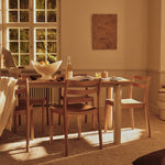 FermLiving_SS26_BodaDiningChair_1104272938_AturaDiningTable_1104273614_FountainGlassBowl_1104272627_1104272628_SeifaRug_1104272842 (1).jpg