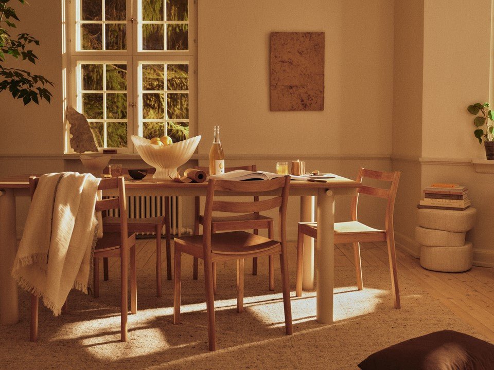 FermLiving_SS26_BodaDiningChair_1104272938_AturaDiningTable_1104273614_FountainGlassBowl_1104272627_1104272628_SeifaRug_1104272842 (1).jpg