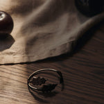 FermLiving_Holiday2025_HollyLeafNapkinRings_SetOf4_BlackBrass_1104271780_3.jpg