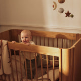 FermLiving_SS26_SkyeMobile_1104273156_TiluBabyCot_1104273074_SkyeBlanket_1104273046_StarCushion_1104273196.jpg