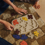 FermLiving_AW25_PoesiePuzzle_Multi_1104272365_MaraWashableRug_Tan-WarmSand_1104271998.jpg