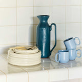 Barro-Plate-dia18_dia24-set-of-2-off-white_Barro-Jug-dark-blue_Barro-Cup-Set-of-2-light-blue_MVS-Cutlery-set-of-4-yellow.jpg