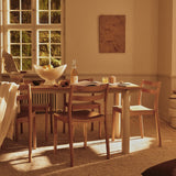 FermLiving_SS26_BodaDiningChair_1104272938_AturaDiningTable_1104273614_FountainGlassBowl_1104272627_1104272628_SeifaRug_1104272842 (1).jpg
