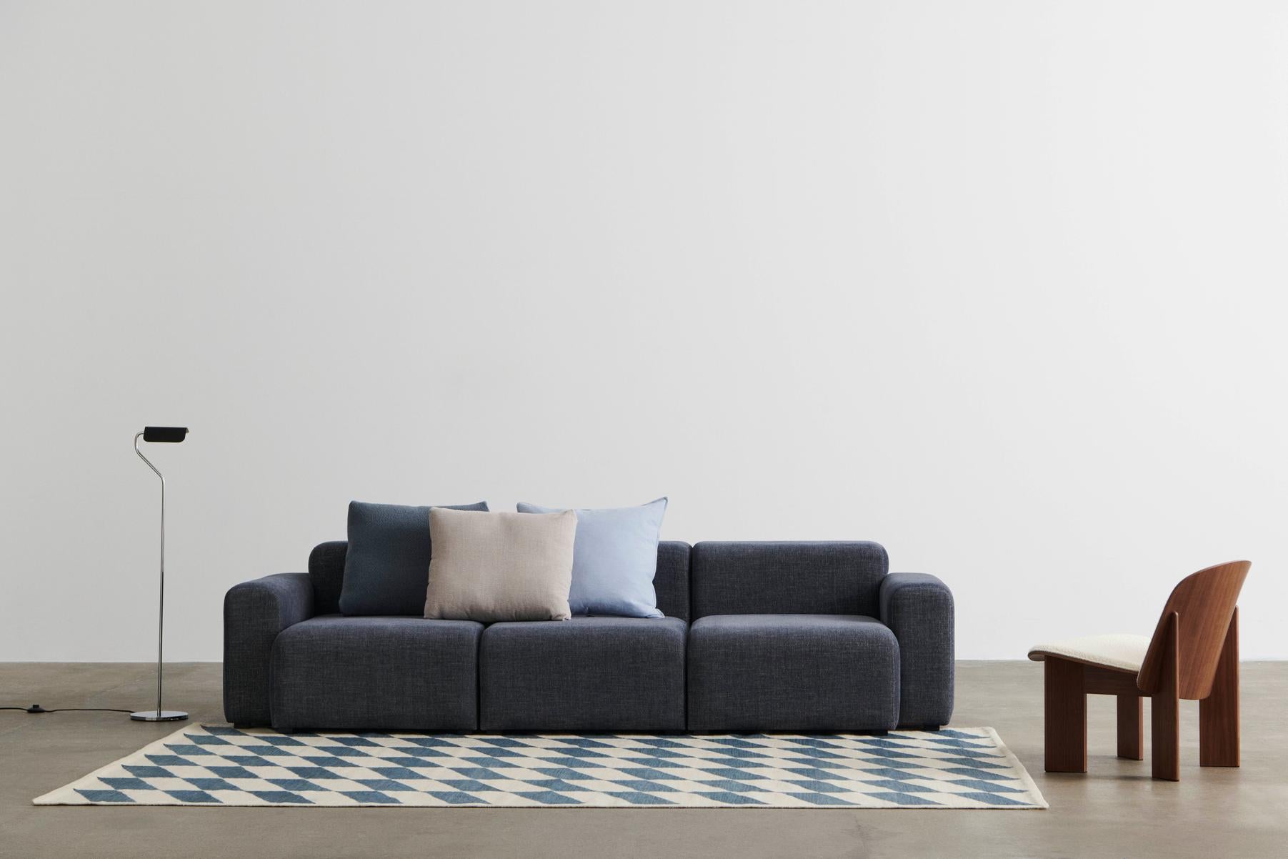 Mags Low 3 Seater comb 1 Overlap 03_Chisel Lounge Chair front uph Volume by HAY 01 and wb lacquered walnut_Apex Floor Lamp iron black_Shift Kelim Rug blue 01.jpg