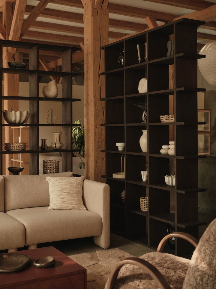 FermLiving_KonaBookcase_3x6_DarkStained_1104272382_FaldaSmockedCushion_Undyed_1104272242_1104272378_BellureCentrepiece_35_RusticBronze_1104272110_BellureBowl_17_RusticBronze_1104272111_BurlStorageCoffeeTable_Da.jpg