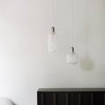 2022_Amp_Lamp_Small_Matt_White_605741_Amp_Lamp_Large_Matt_White_Rib_Cabinet_Black_Oak_02.jpg