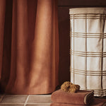FermLiving_SS26_ChambrayShowerCurtain_1104272793_FioLaundryBasket_1104273166_EkkoHandTowel_1104272797_EkkoBathTowel_1104272800 (1).jpg