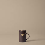 FermLiving_SS26_PackshotsWithBackground_KoyoTeaMugWithInfuserSet_DarkBrown-Buff_1104272735.jpg