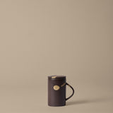 FermLiving_SS26_PackshotsWithBackground_KoyoTeaMugWithInfuserSet_DarkBrown-Buff_1104272735.jpg