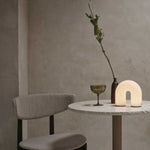 fermLIVING_AW24_VueltaPortableLamp_1104270173_HostCocktailGlasses_SetOf2_MossGreen_1104269475_HermanDiningChair_WoodFrame_DarkStainedBeech_SoftBouclé_Natural_1104269393.jpg
