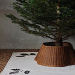 FermLiving_Holiday2025_DrapeBraidedTreeSkirt_Natural_1104271818_OakChristmasTreeBlanket_Square_Natural_1104271877.jpg