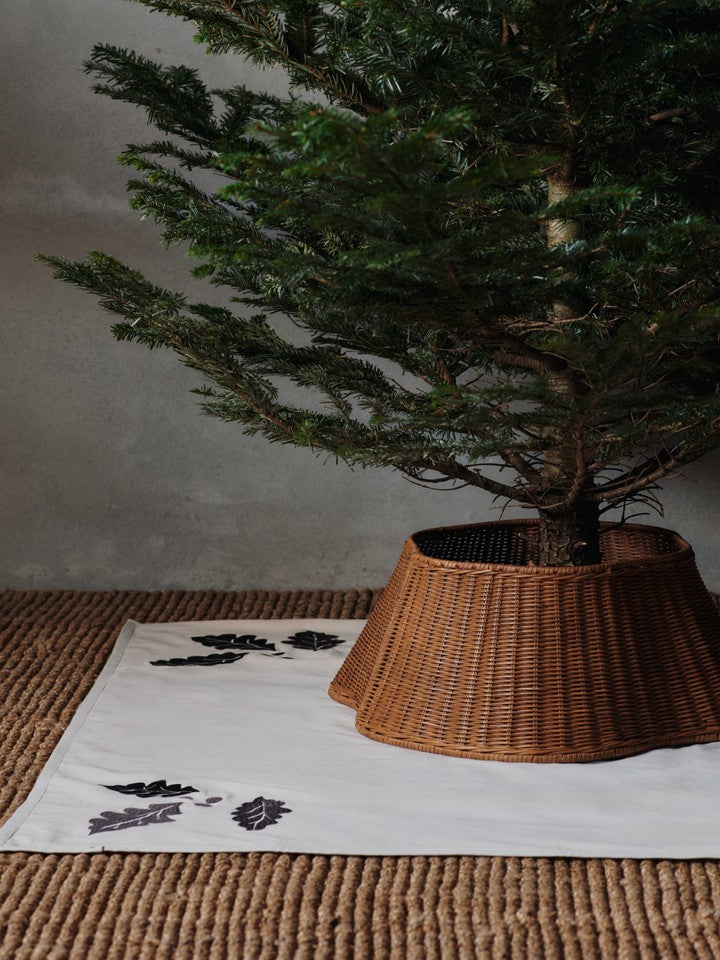 FermLiving_Holiday2025_DrapeBraidedTreeSkirt_Natural_1104271818_OakChristmasTreeBlanket_Square_Natural_1104271877.jpg