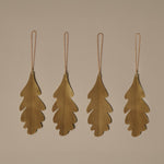 FermLiving_Holiday2025_PackshotsWithBackground_OakLeafBrassOrnaments_SetOf4_Brass_1104271778.jpg