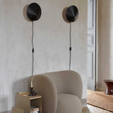 fermLIVING_SS23_VaultSideTable_1104267283_RicoLoungeChair_1104267276_ArumWallSconce_1104266372_1104266375_image_02.jpg