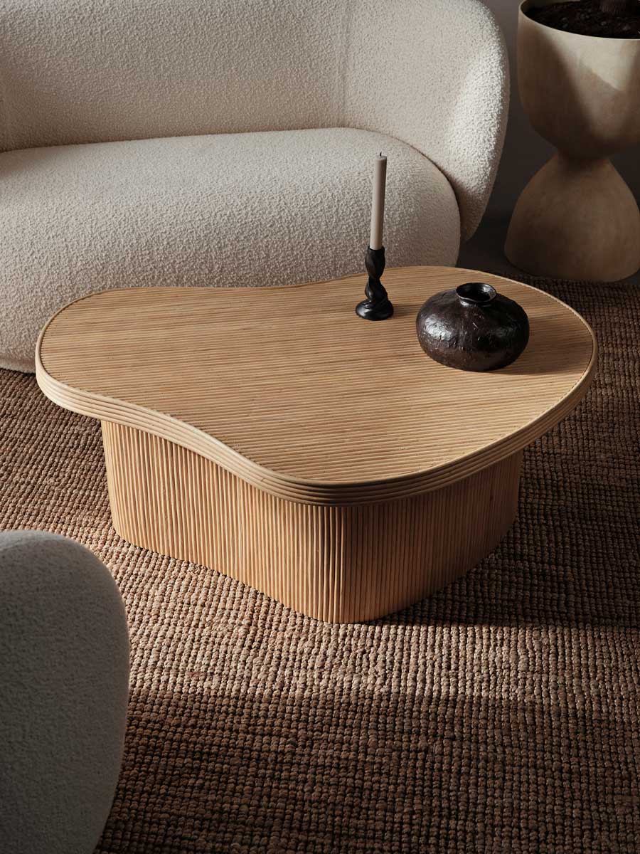 fermLIVING_SS24_IsolaCoffeeTable_Natural_1104269015_GaleCandleHolder_H13_1104268693_DoroVase_H11_Coffee_1104269044_1.jpg