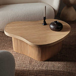 fermLIVING_SS24_IsolaCoffeeTable_Natural_1104269015_GaleCandleHolder_H13_1104268693_DoroVase_H11_Coffee_1104269044_1.jpg