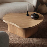 fermLIVING_SS24_IsolaCoffeeTable_Natural_1104269015_GaleCandleHolder_H13_1104268693_DoroVase_H11_Coffee_1104269044_1.jpg