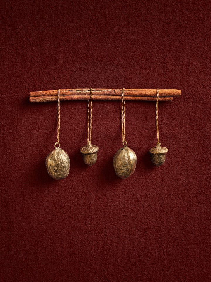 FermLiving_Holiday2026_WalnutOrnaments_SetOf2_Brass_1104274473_AcornOrnaments_SetOf2_Brass_1104274474.jpg