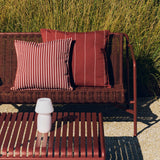 Palissade Cord Lounge Sofa_Palissade Low Table iron red_Terrazza Cushion terracotta narrow stripe_Terrazza Cushion terracotta bold stripe.jpg
