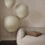 fermLIVING_AW24_Nesten2-Seater_Re-Cotton_1104270253_KurbisLampshade_DarkSage_1104269824_1104269825_1104269826_MoorCushion_Olive_1104269838.jpg