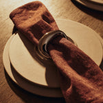 FermLiving_SS26_HaleNapkins_1104272701_OrrithNapkinRings_1104272494_SonaeDinnerPlates_1104273003_1104272999.jpg