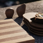 FermLiving_AW25_StribeCuttingBoard_Walnutandoak_1104272376_CairnButterBoards_SetOf4_Oak_1104269522_CairnEggHolder_SetOf2_Oak_1104269608.jpg