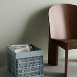HAY-Colour-Crate-Cube-dusty-blue_Chisel-Lounge-Chair-wb-lacquered-walnut.jpg
