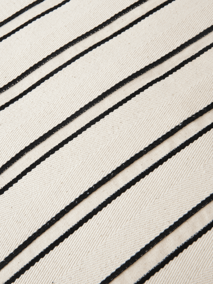 FermLiving_AW25_TwillCushions_Off-white-Black_1104272017_1104272019_1104272021_1104272071_1104272066_2.png
