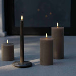 Beige-assorted-pillar-candles-&-a-taper-large.jpg