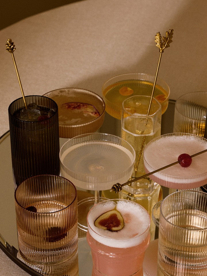 FermLiving_Holiday2026_RippleTumblerGlasses_1104274226_1104270635_RippleHighballGlasses_1104274212_RippleChampagneSaucers_1104274217_5444_OakLeafStirSticks-Long_1104273857_ForestStirSticks-Long_1104273858.jpg