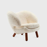 pelican-chair_house-of-finn-juhl_walnut_offwhite-sheepskin_01.jpg