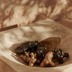 FermLiving_SS25_HewLowCentrepiece_Travertine_1104271230_ComberHooks_1104270840_1104270841_1104270839_1104270838_1104270843_1104270842-(1).jpg