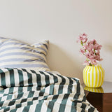 Ete-dark-green_Juice-Vase-yellow.jpg